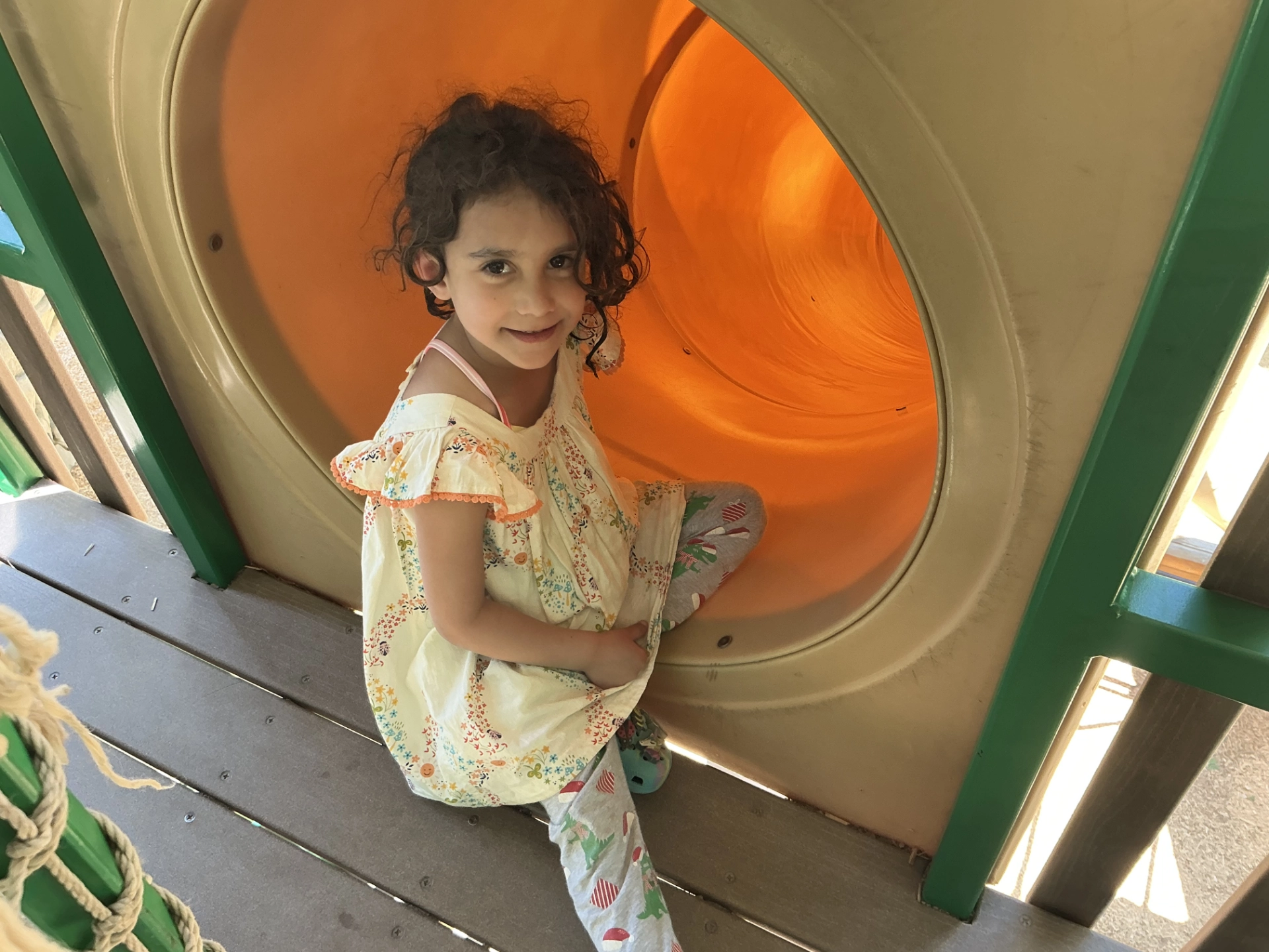 Simona emerging from the slide