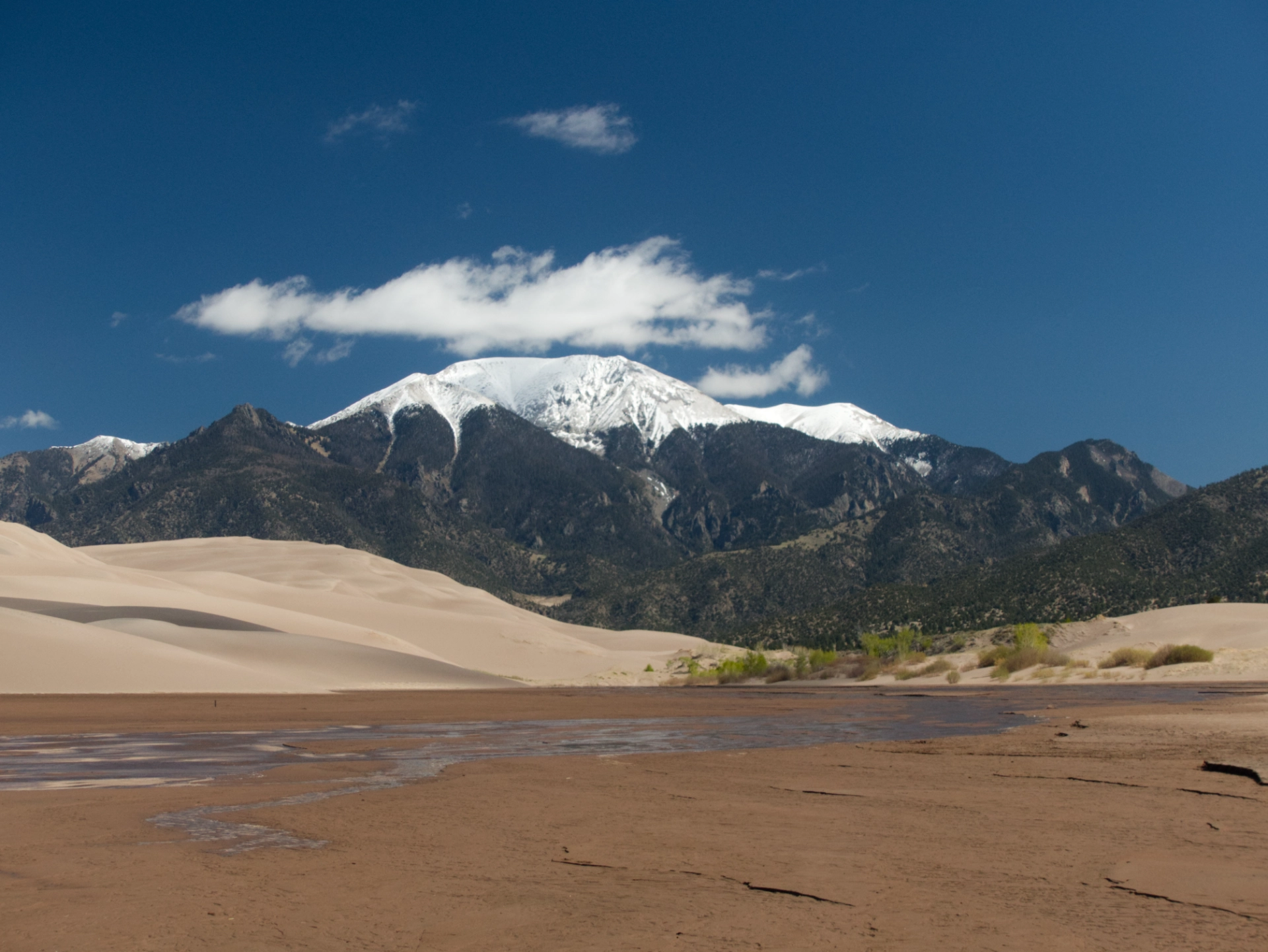Medano Creek and snow-capped Herard Mountain