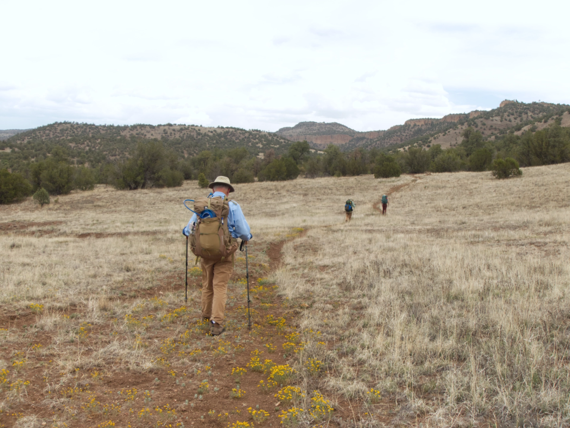hikers crossing North Mesa