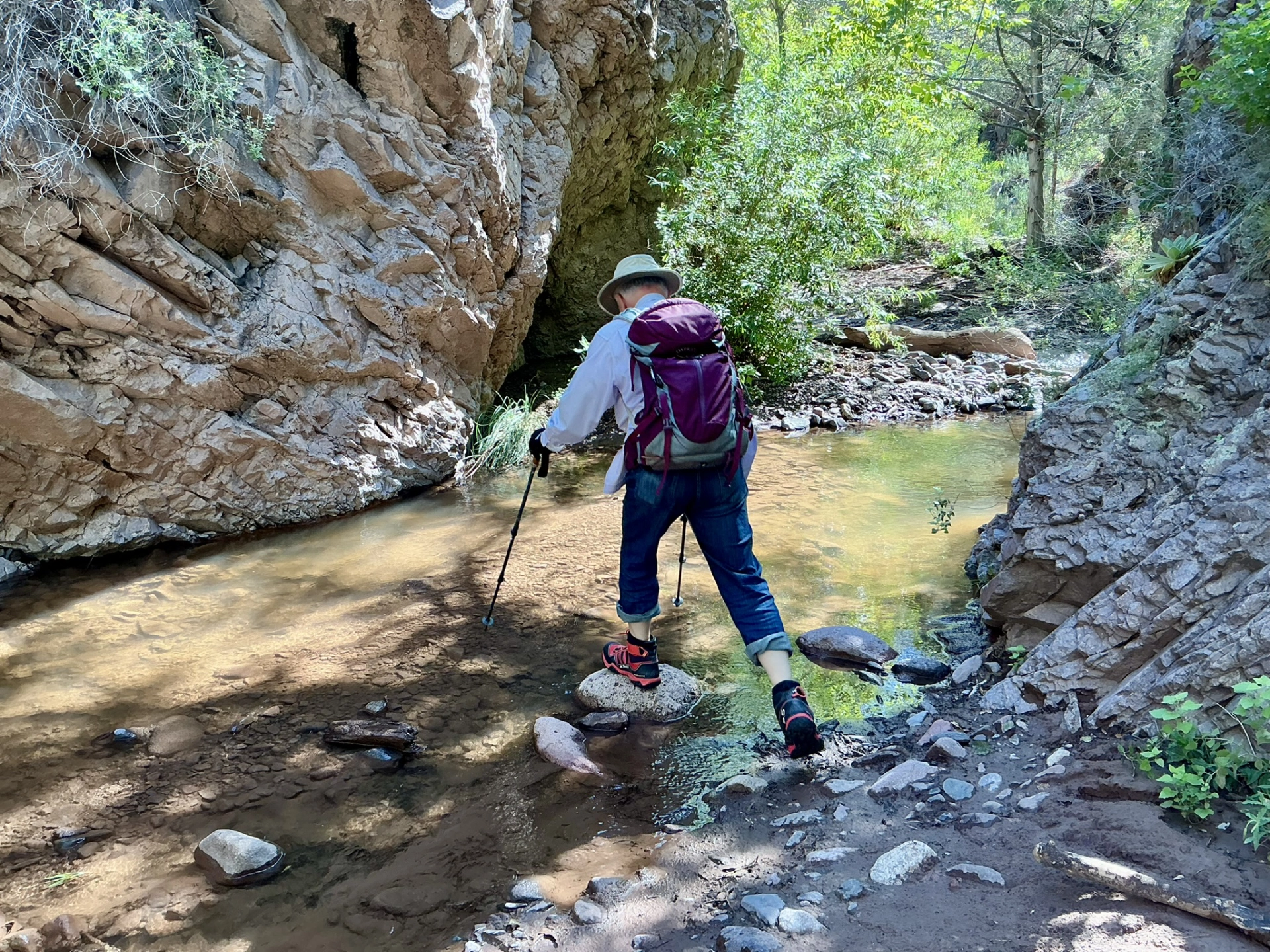 Dennis crossing a creek