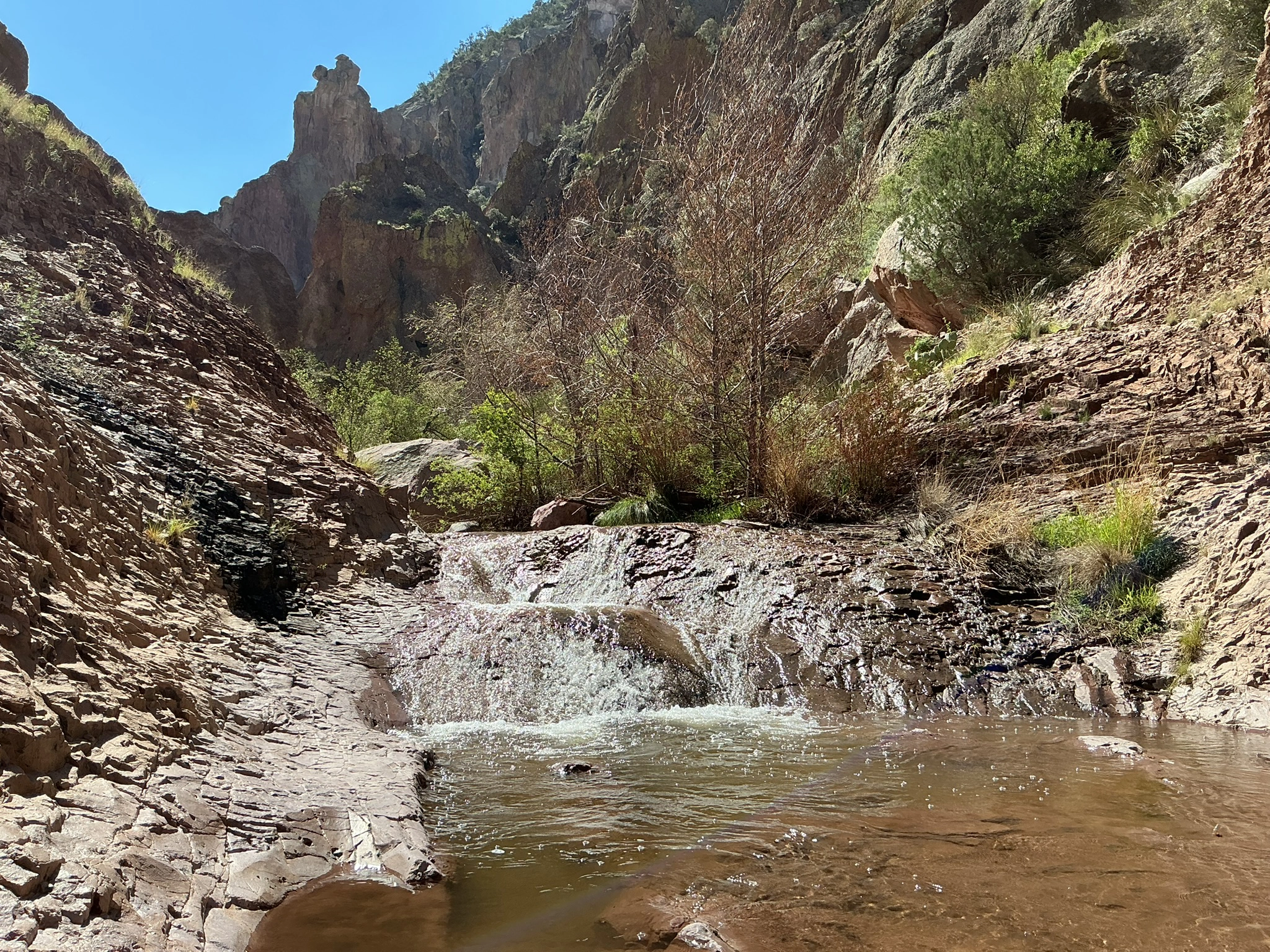 small waterfall in a rocky canyon