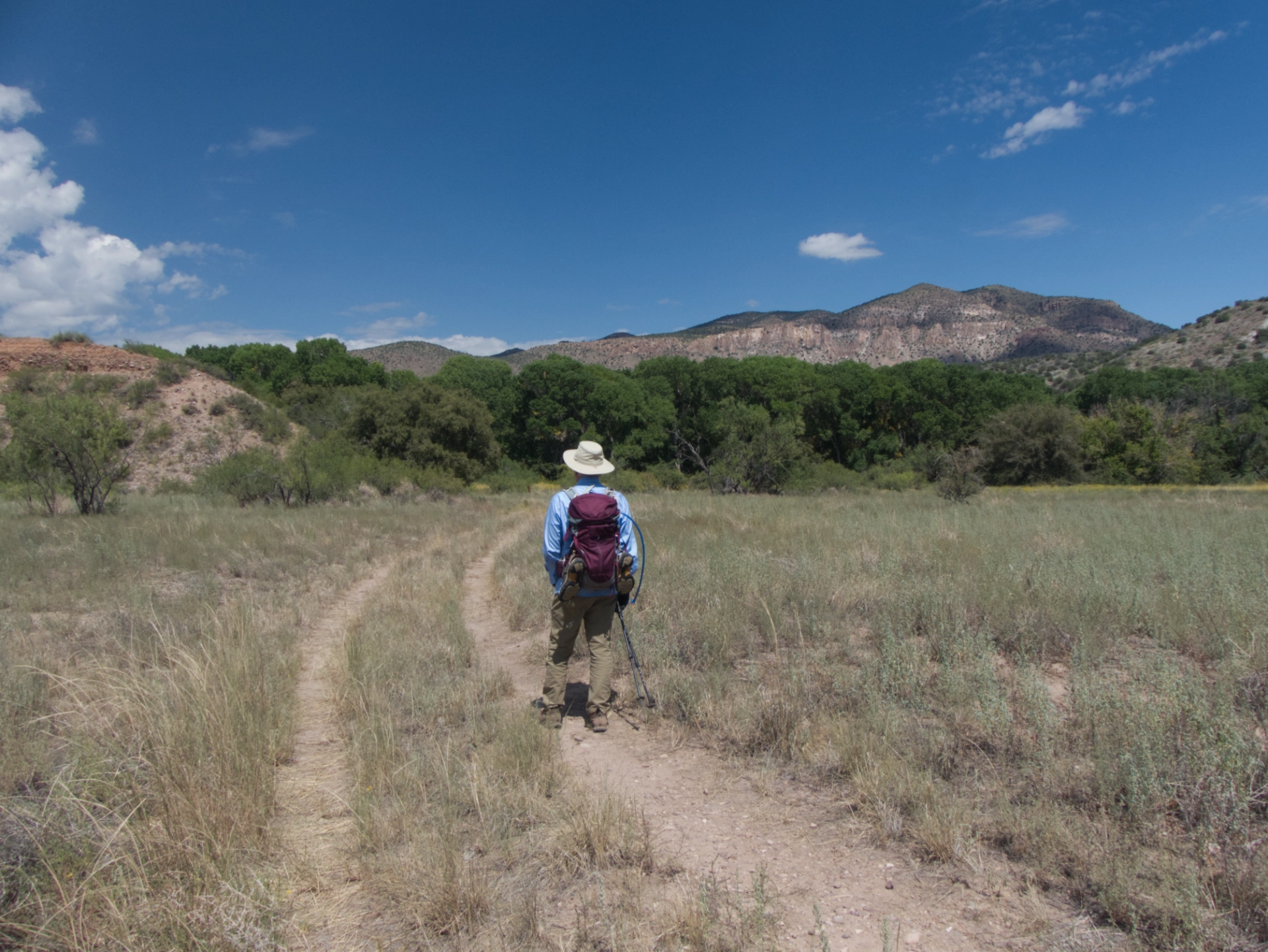 Dennis hiking an old road along the Gila River