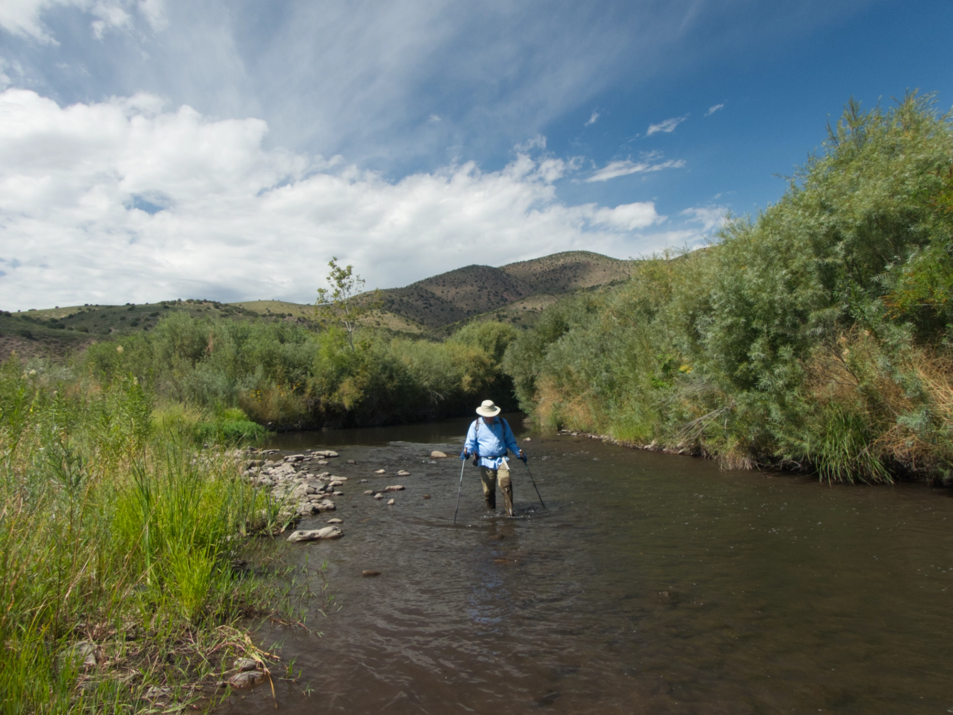 Dennis hiking downstream in the Gila River