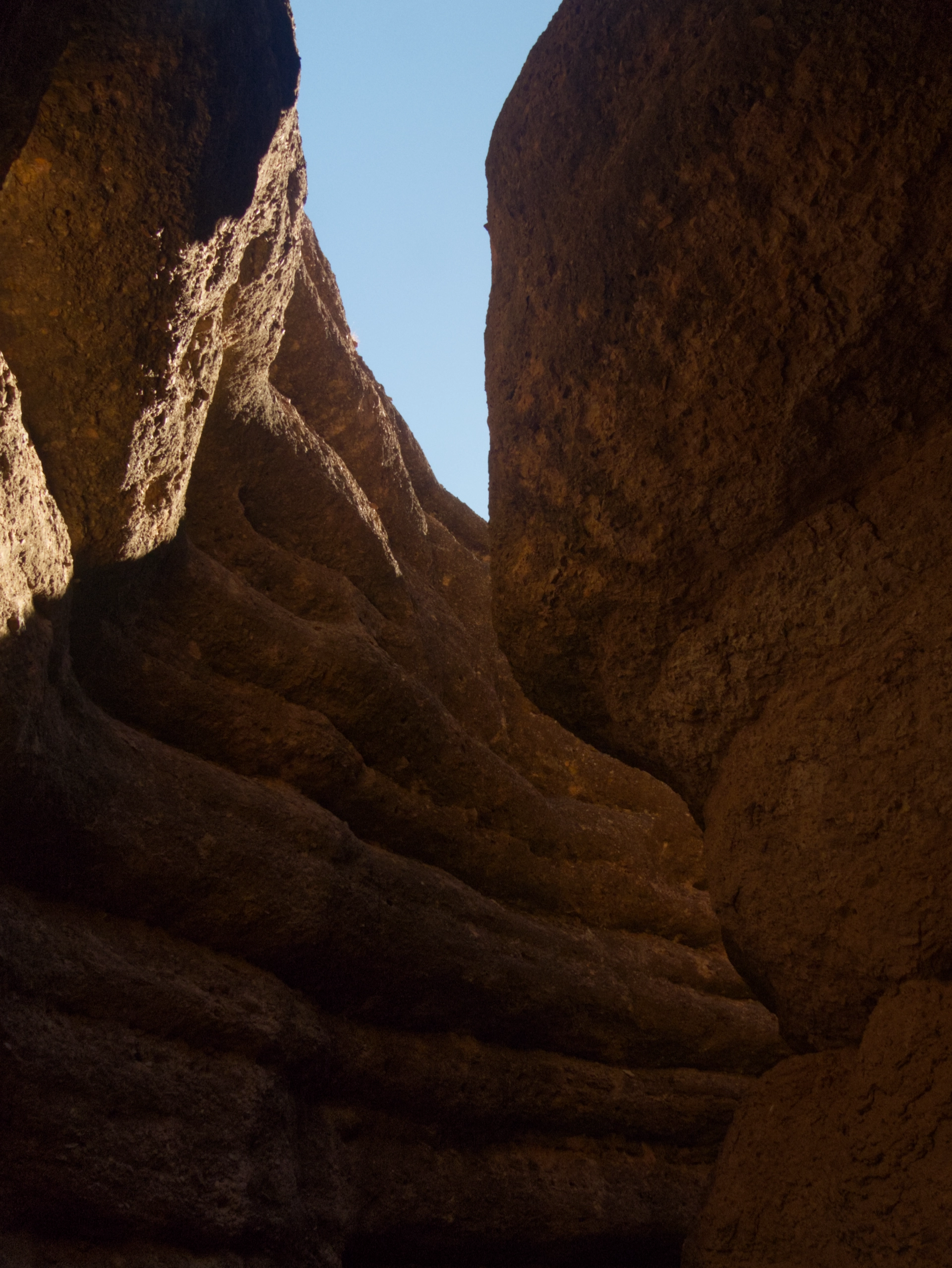 view of the sky through the narrow slot