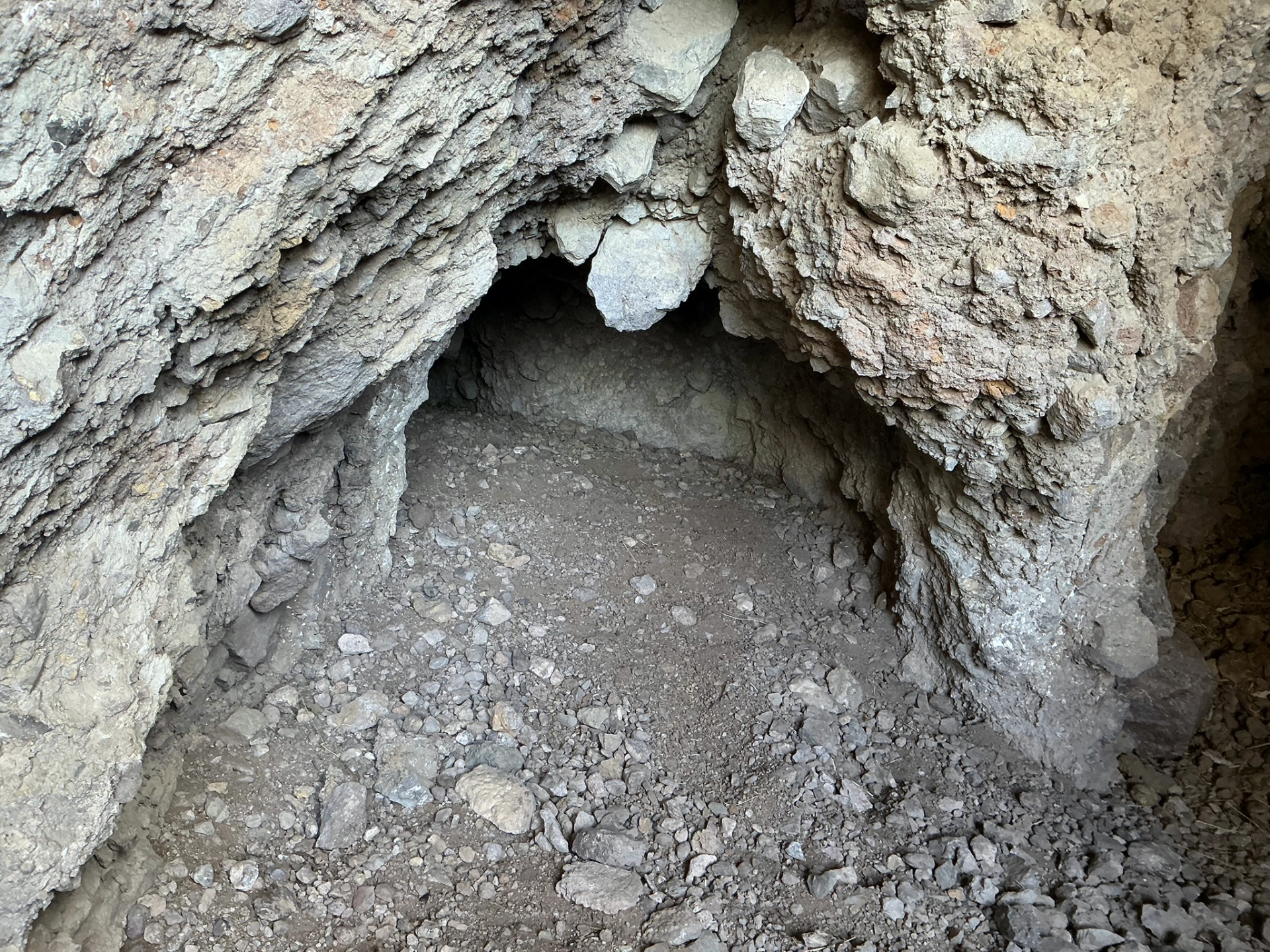 small cave with blackened ceiling