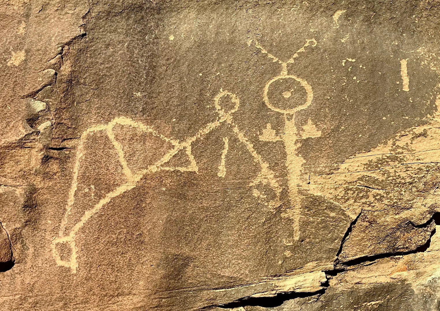 petroglyph seeming to give two thumbs or fingers up