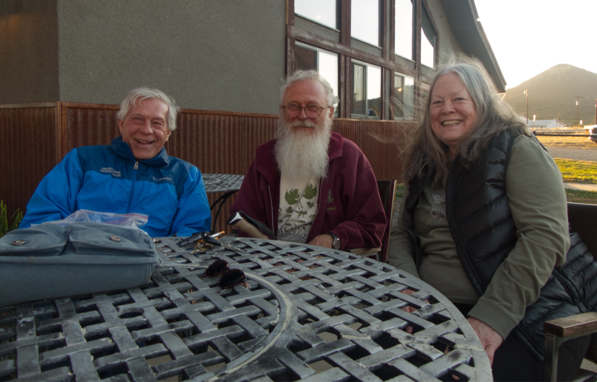 Dennis, Tom and Ann waiting for a table