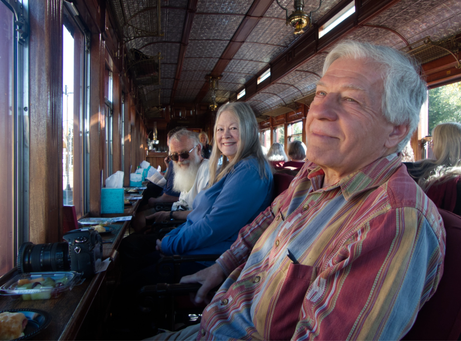 Tom, Ann and Dennis in the parlor car