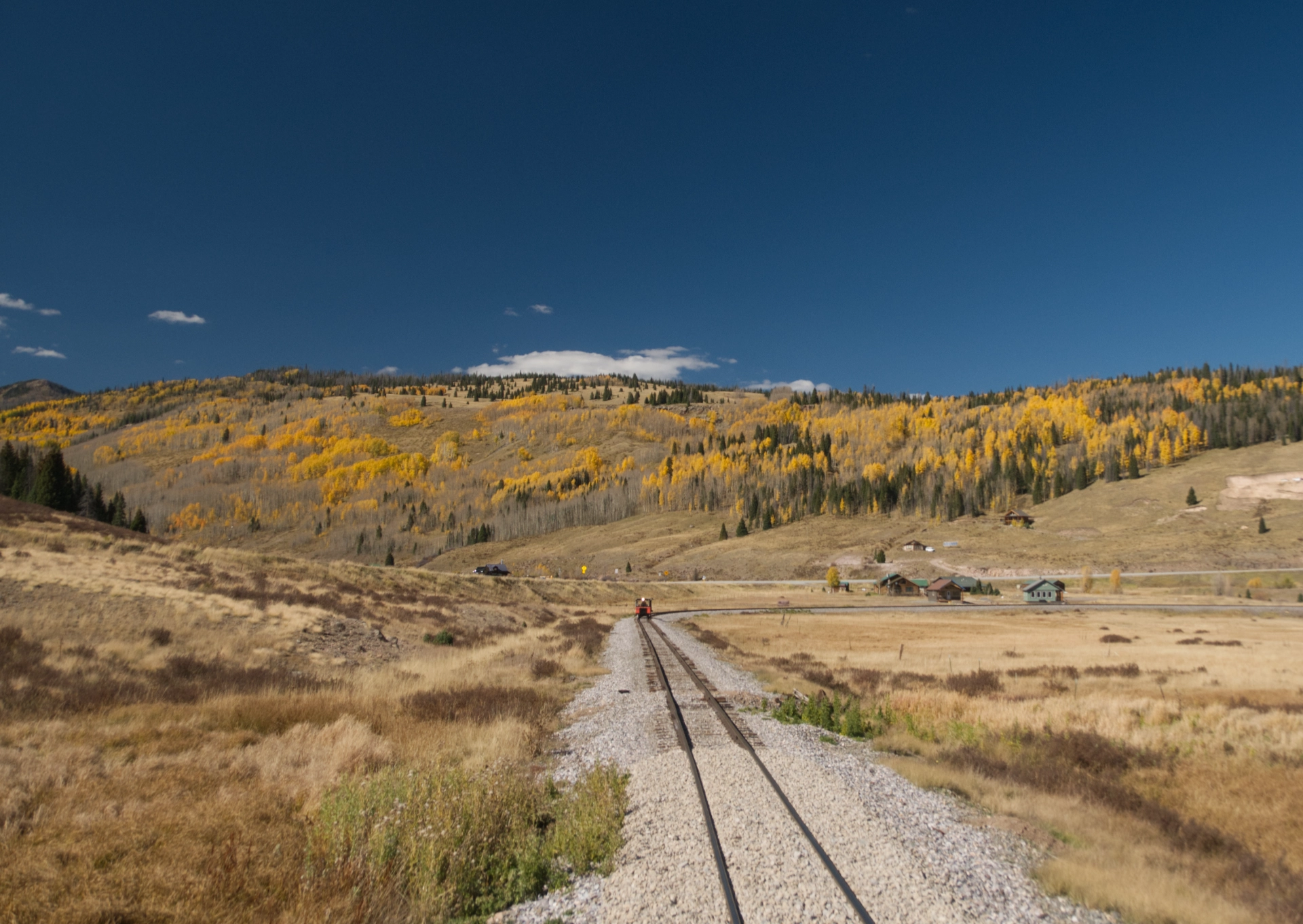 distant view of the speeder and golden hills in the background