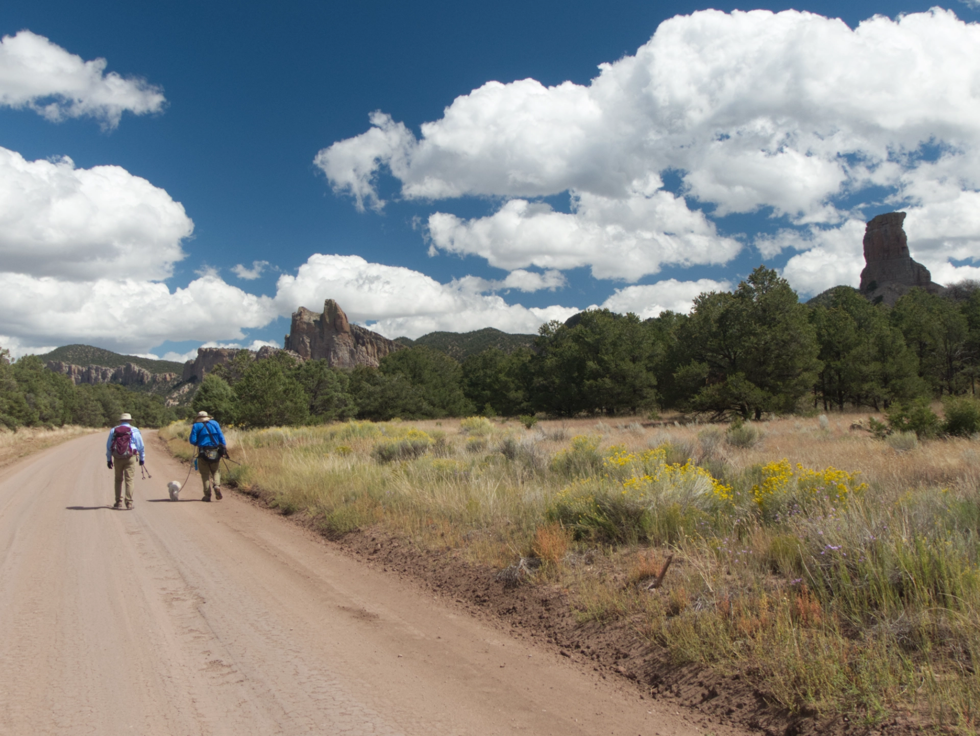 walking along the road with Monument Peak on the right