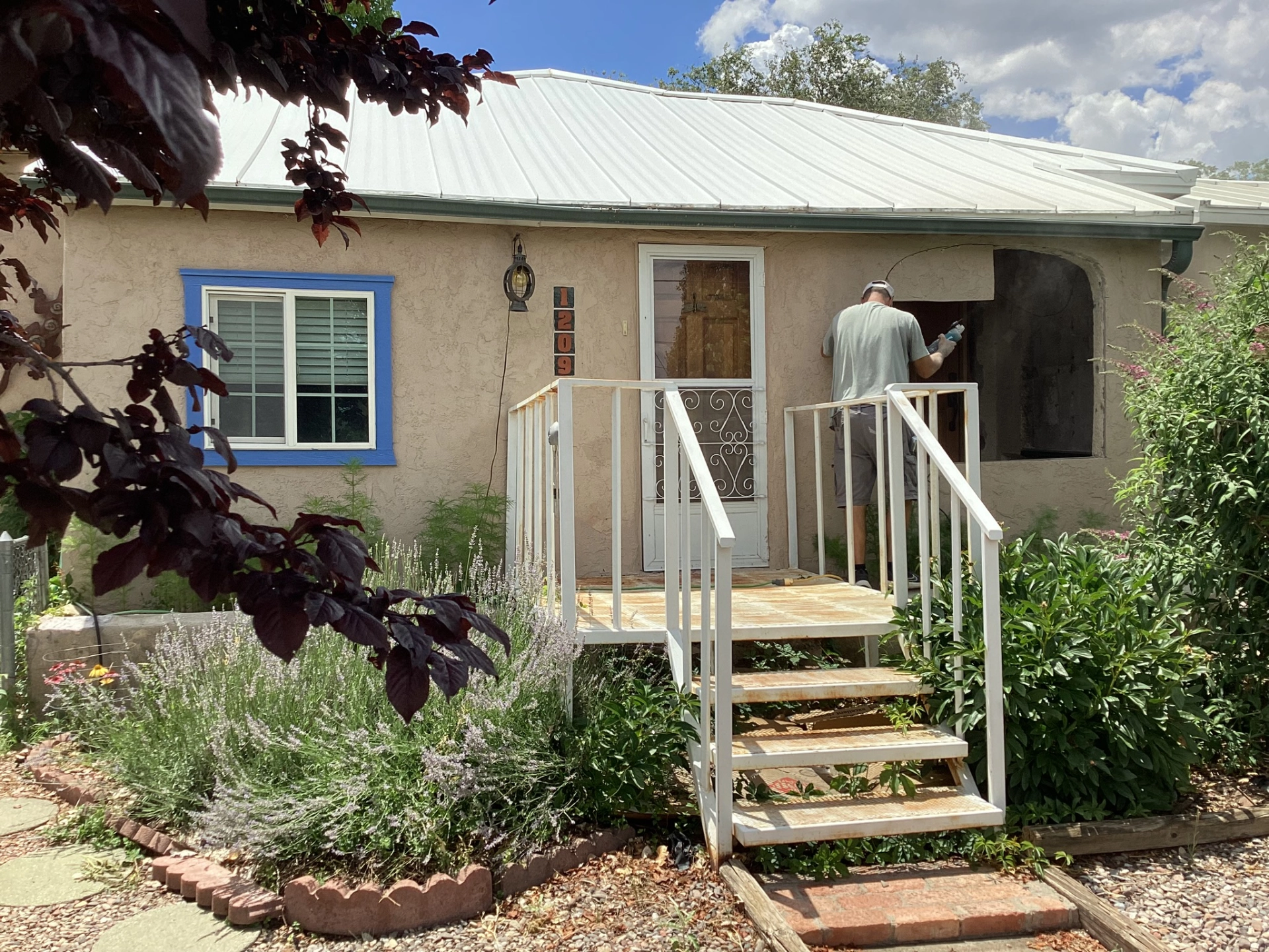 front of the house with arch exposed