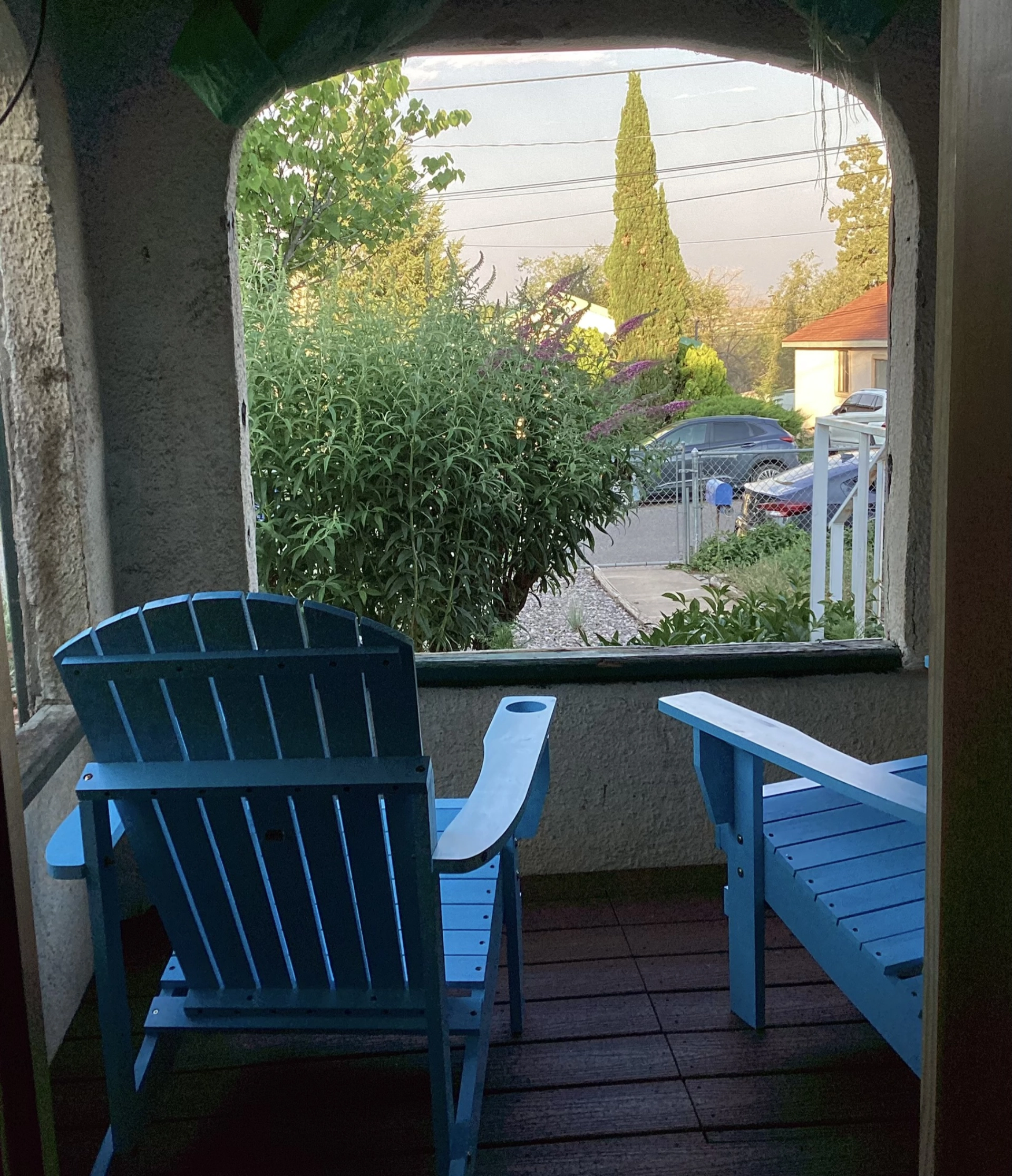 blue chairs on the porch