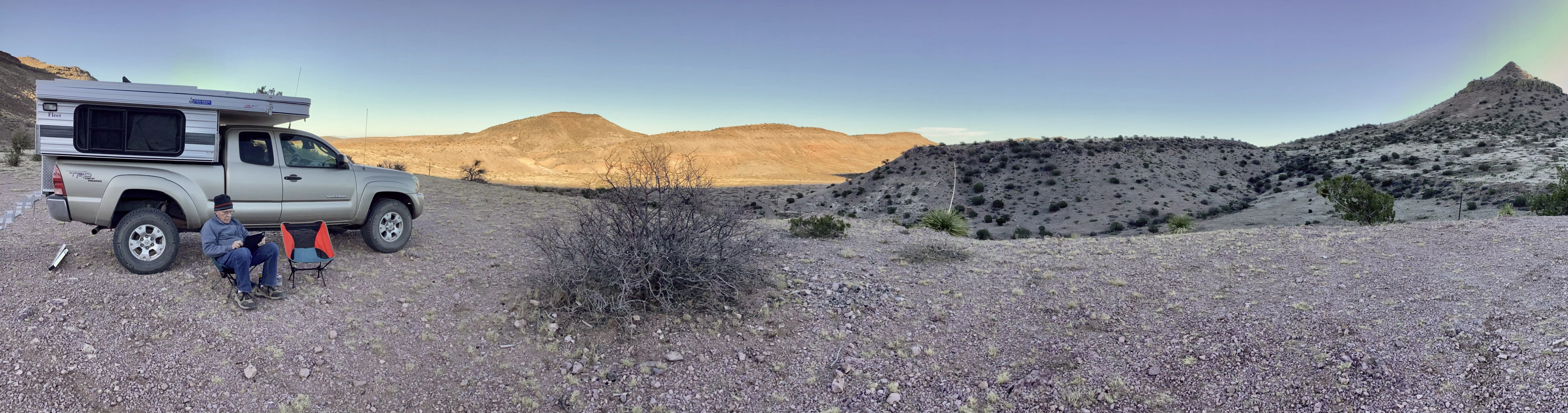 spectacular hilltop campsite at sunset