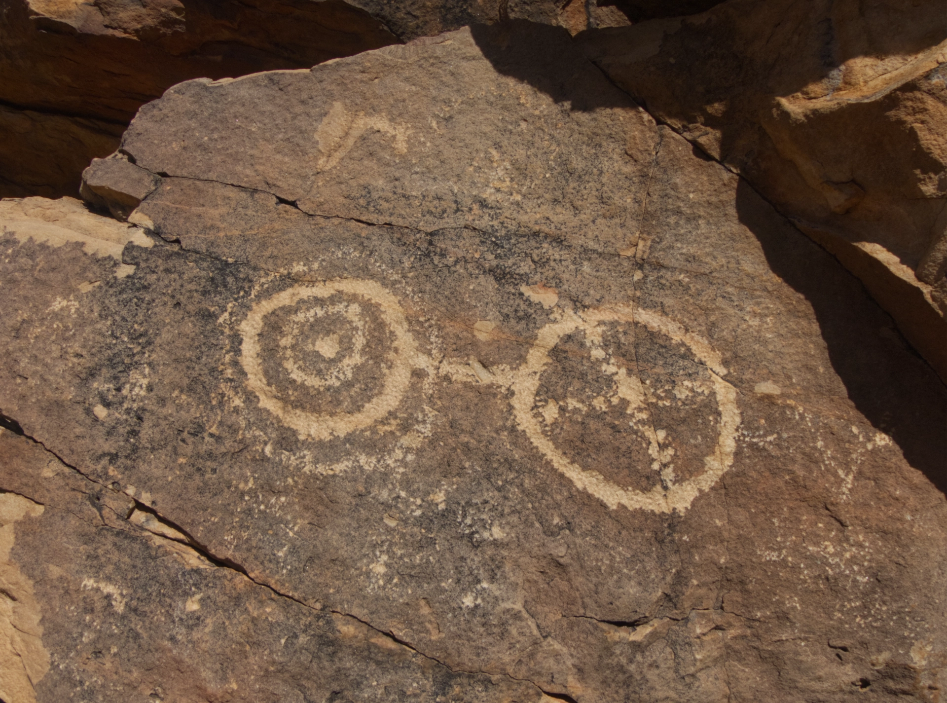 petroglyph with two circles