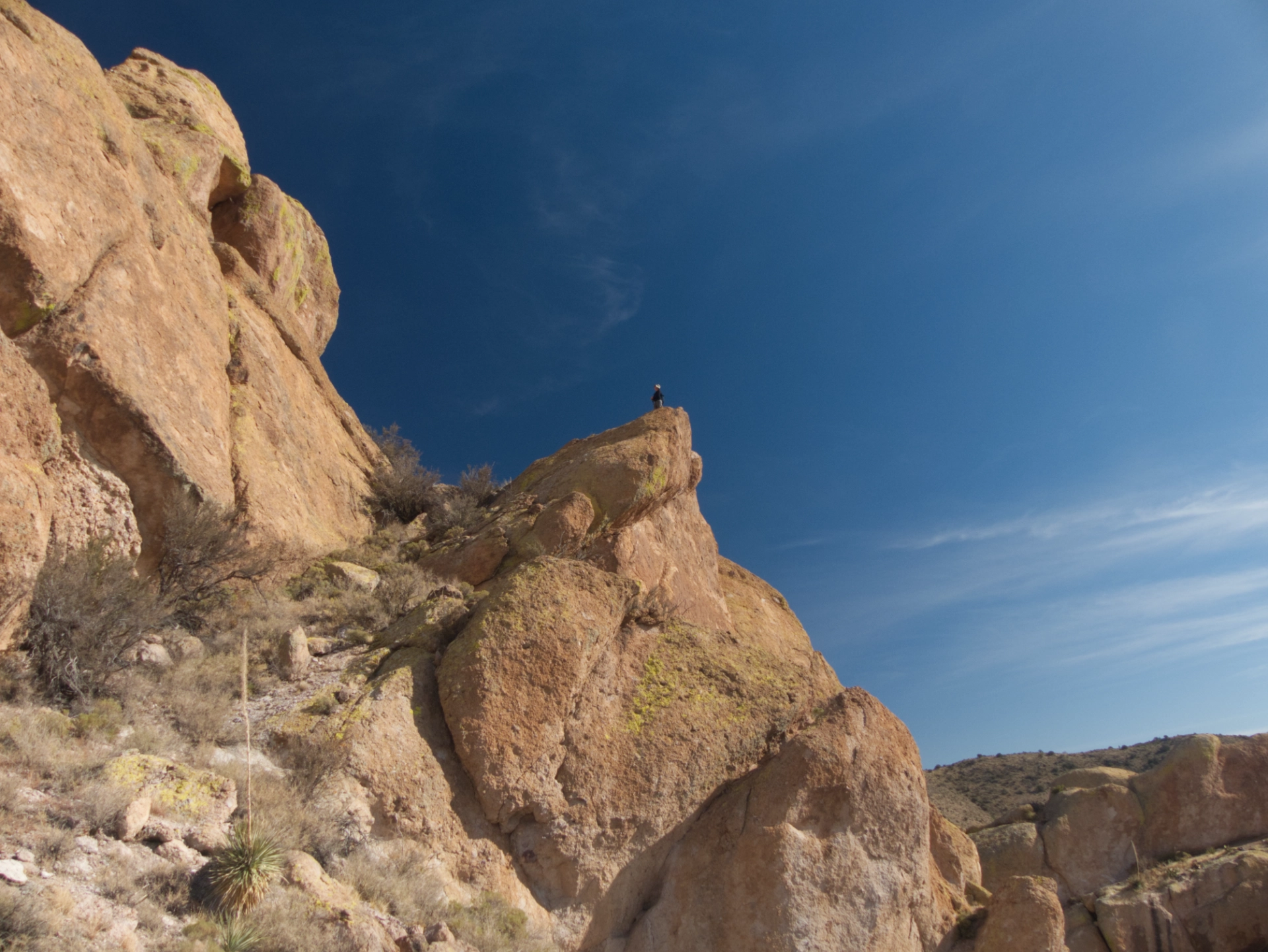 Hiker on a rock pinnacle