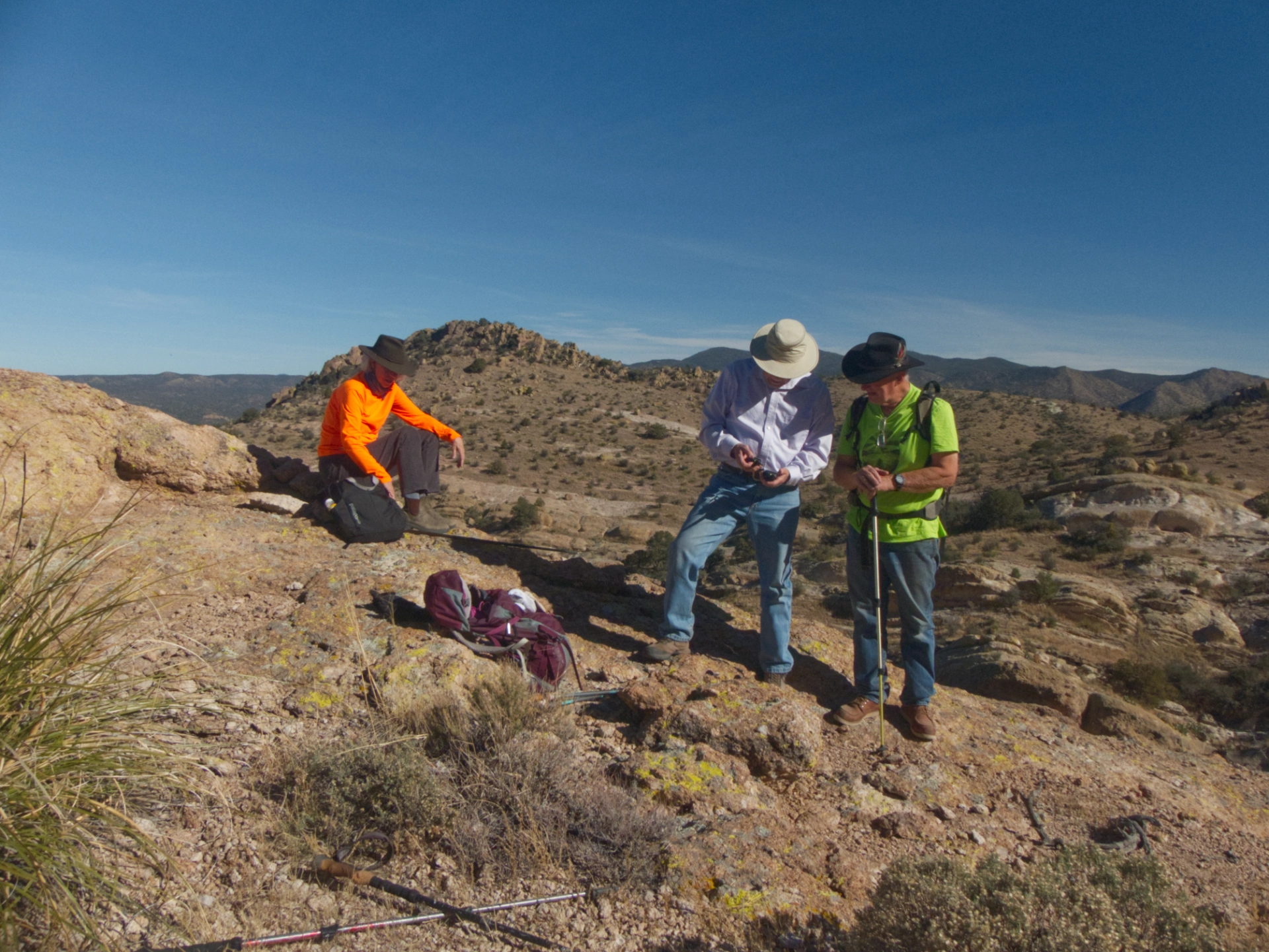 hikers checking FRS radios
