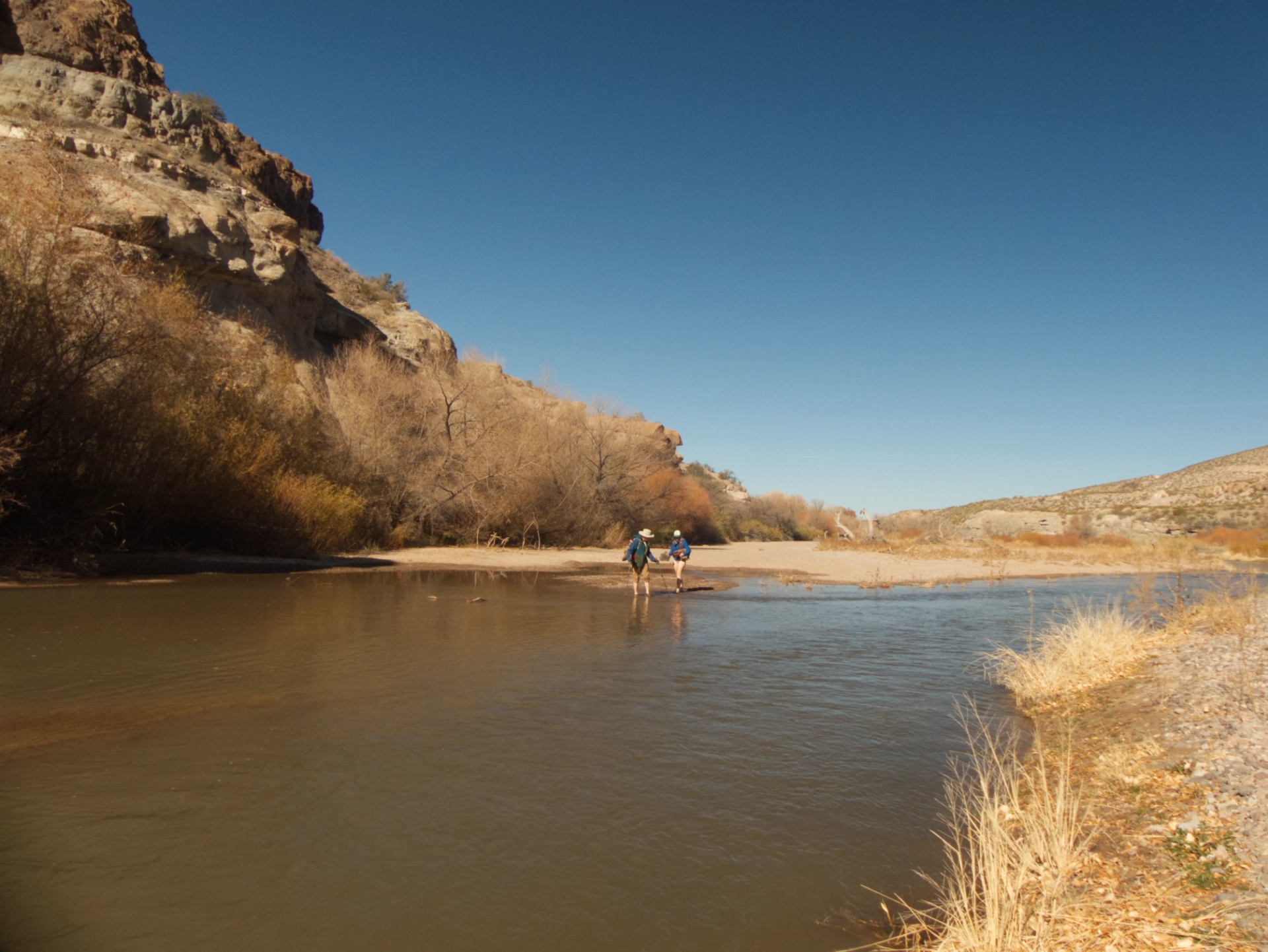 wading across the Gila River