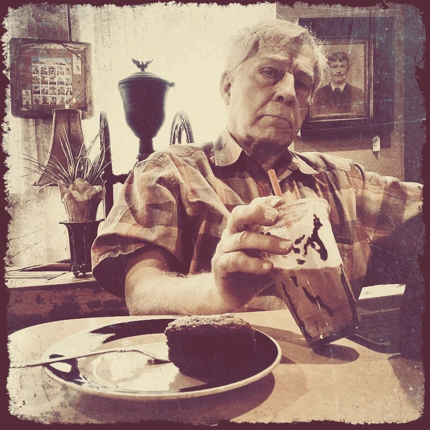 sepia style portrait of Dennis at the coffee shop