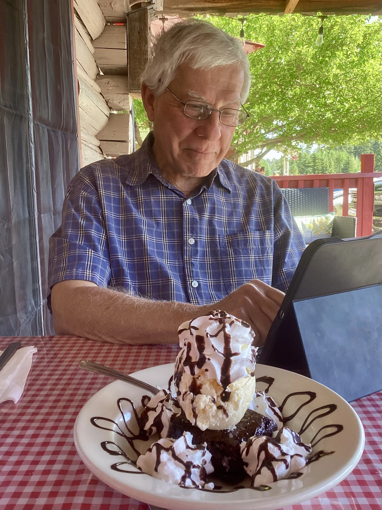 Dennis with an enormous ice cream sundae